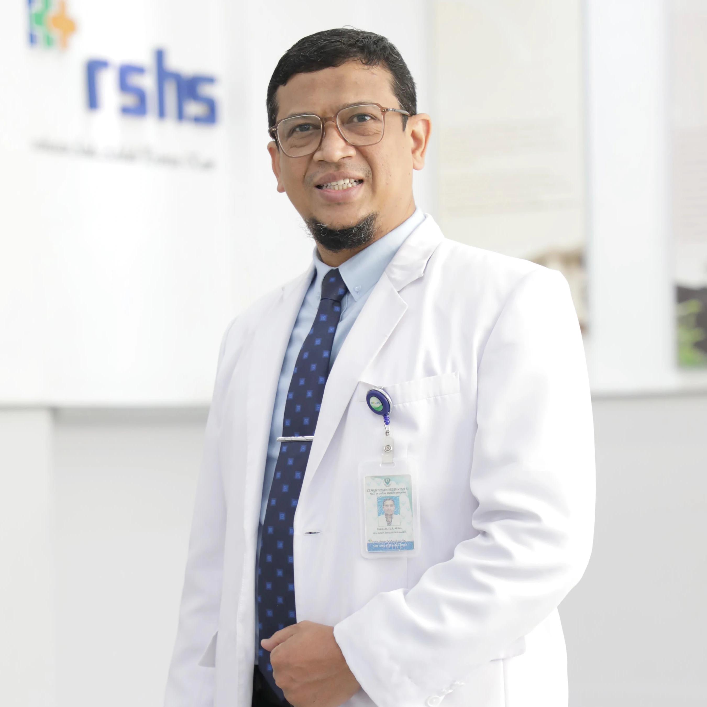 dr. Faisal, Sp.A(K), M.Kes.